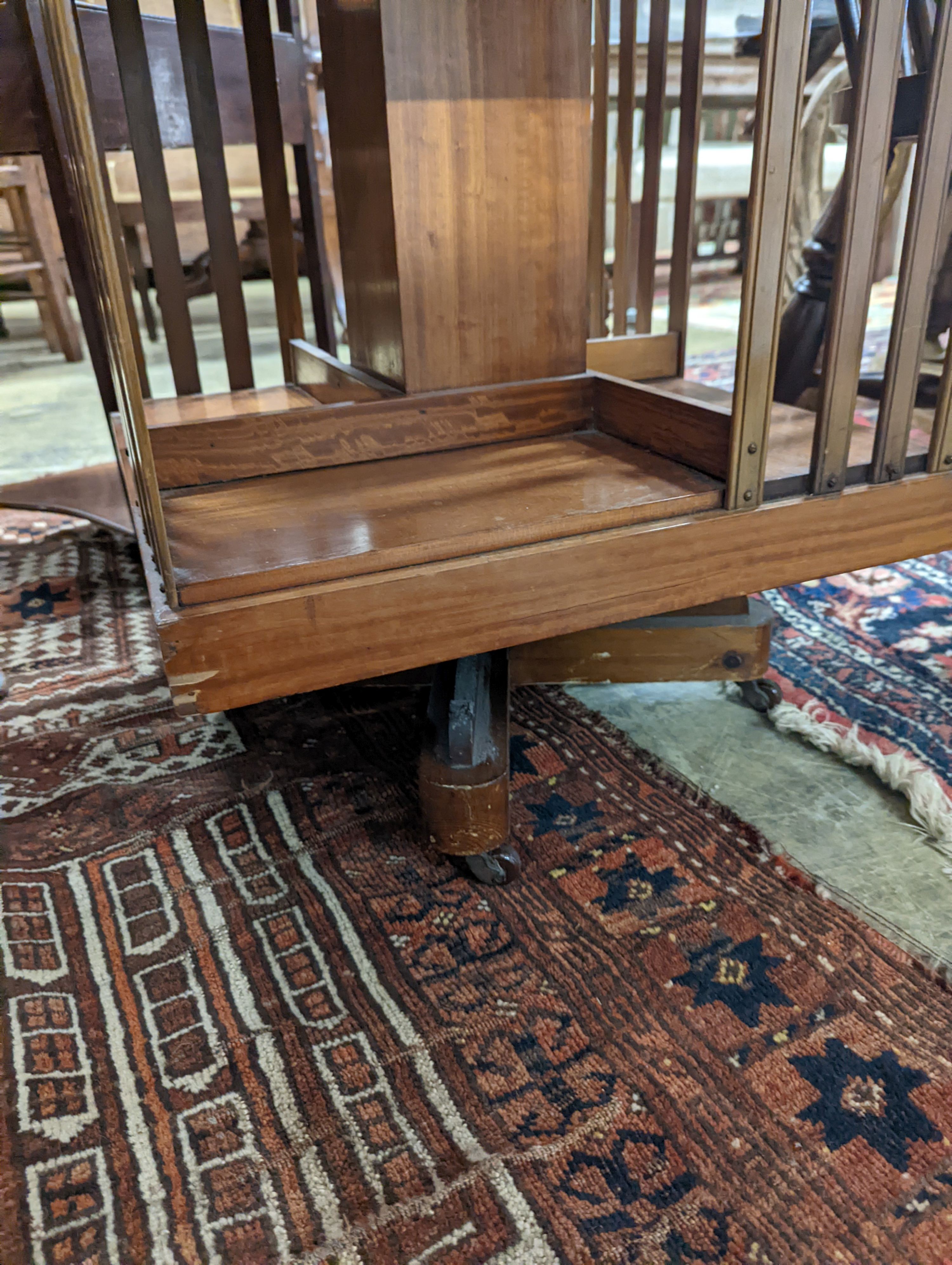 An Edwardian inlaid satinwood revolving bookcase, width 48cm, depth 47cm, height 85cm